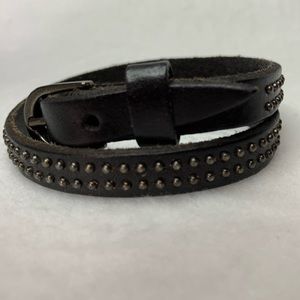 Genuine black leather and  silver stud bracelet.